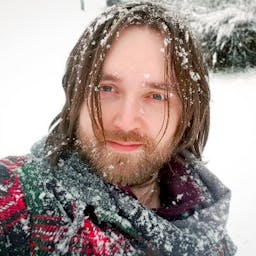 Headshot of Chris Nicholas in the snow